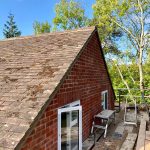 alt="clay tiles roof extension"